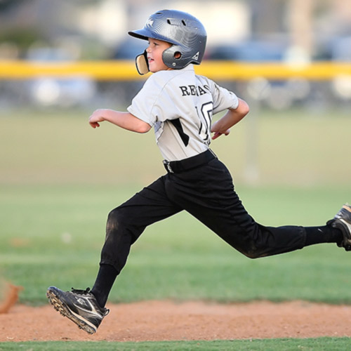 Boy playing baseball